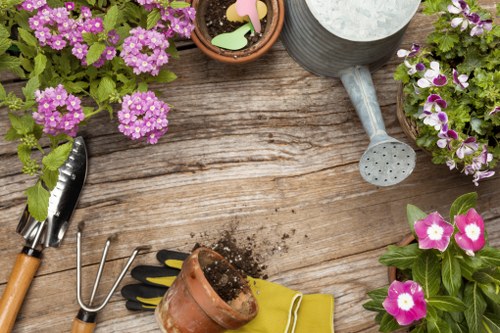 Landscape gardening in Chase Cross with a neatly designed patio and planting
